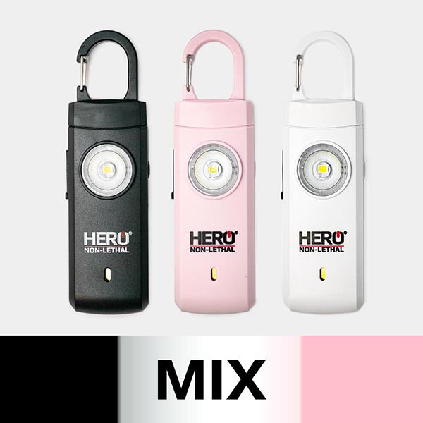 An image showing black, pink, and white color variations of a key chain alarm.